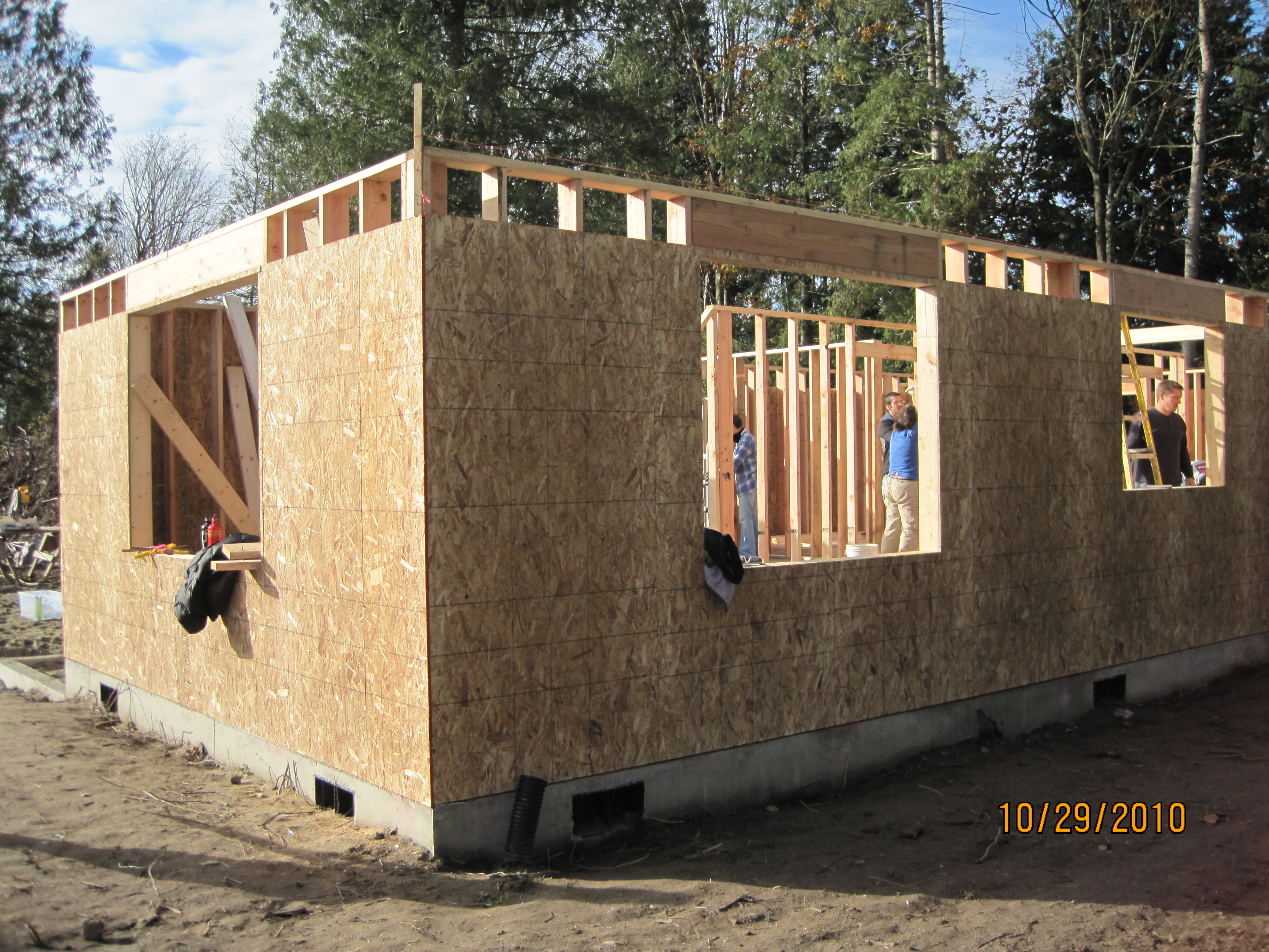 By third week, walls up