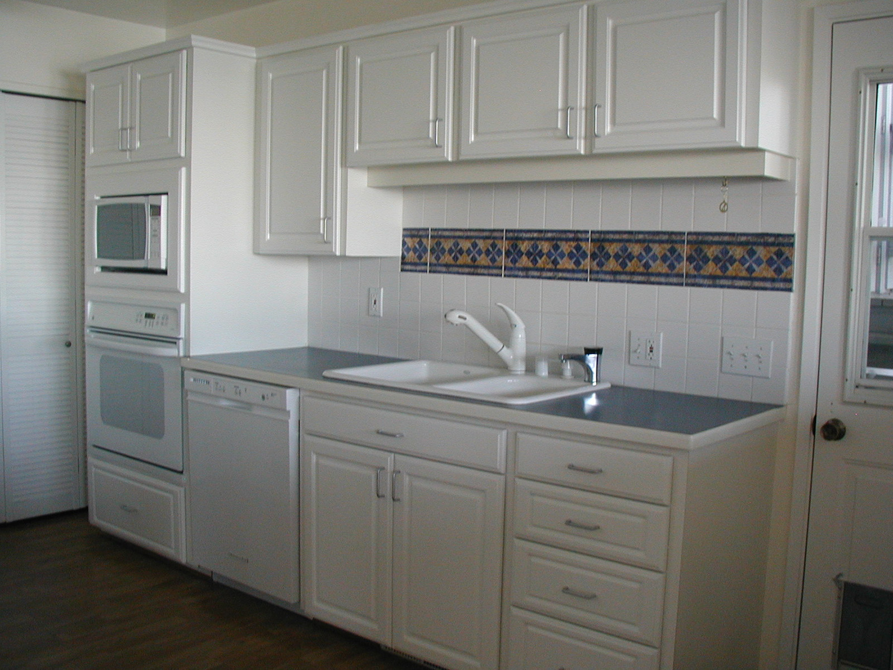 Include Decorative Tile In Your Kitchen Or Bath Design Rose Construction Inc