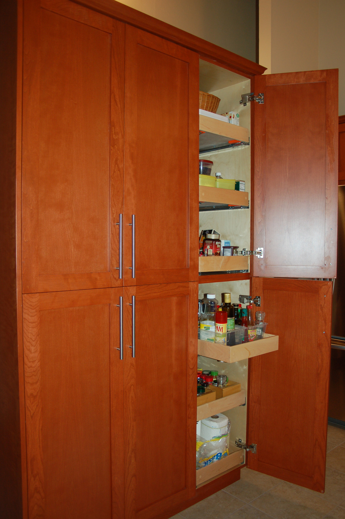 Full height cabinets with pull out drawers.