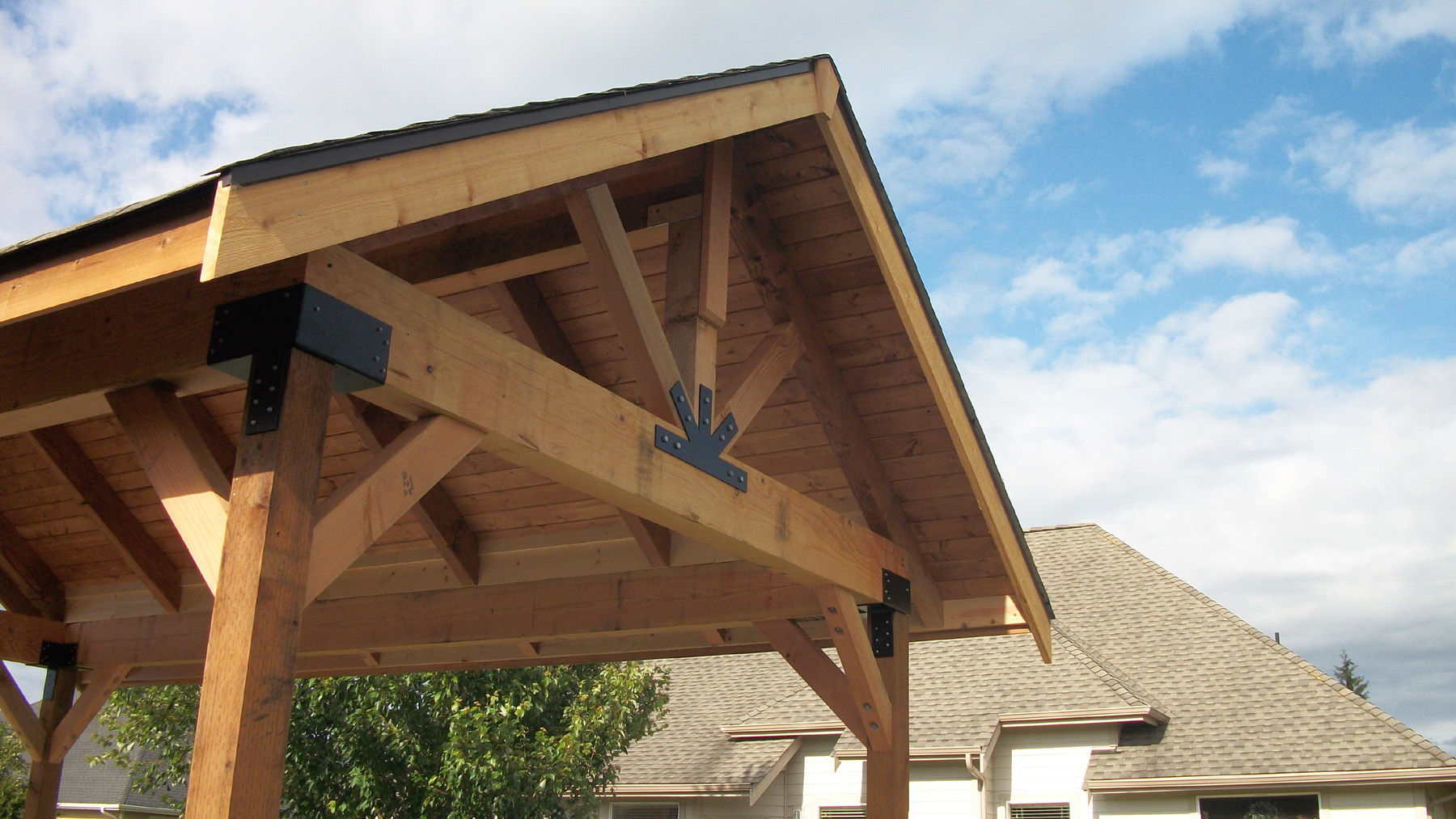 Pergola roof, showing structural and decorative end plate