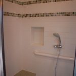 Tiled 5' shower with 2 recessed areas for soap & shampoo