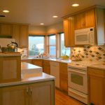 After photo - Kitchen remodel, recessed lighting, new custom cabinets, and Hi-Mac countertop, Bellingham
