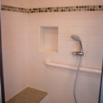 Built in shower bench, grab bar, shower niche