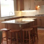 wood floor, kitchen island, custom cabinets
