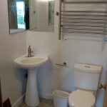 bath, corner pedestal sink, corner mirrors