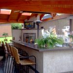outdoor kitchen, fireplace, heat lamp