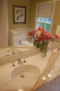 engineered stone countertop, half wall for toilet
